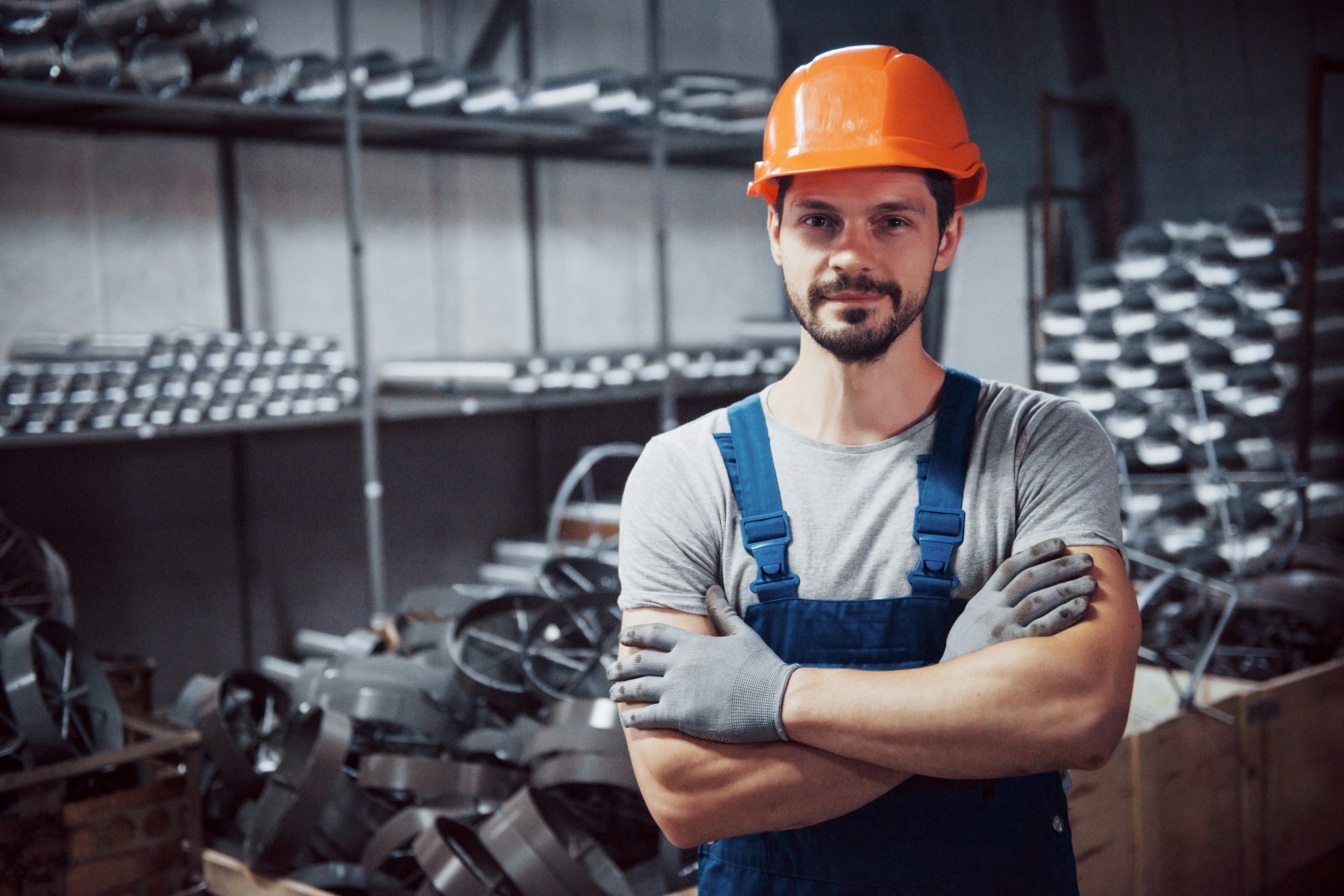 portrait-young-worker-hard-hat-large-metalworking-plant